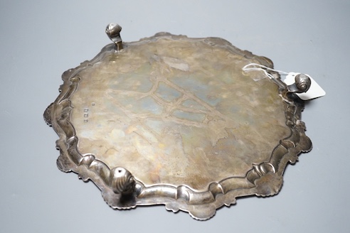 A late George II silver salver, with later engraved decoration, Ebenezer Coker, London, 1758, diameter 32cm, 25.5oz.